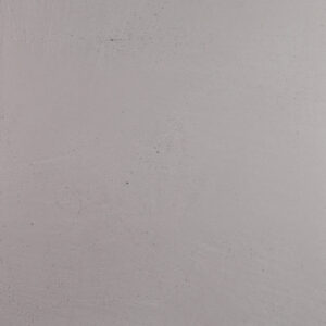 Eine glatte, elegante Wand mit MARMOREA-522 Kalkputz verleiht dem Raum eine moderne und stilvolle Wandgestaltung.
