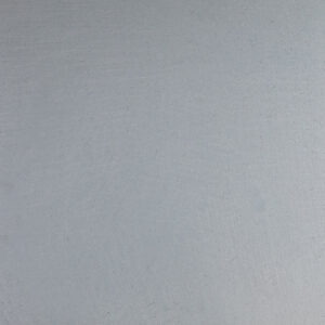 Eine glatte, graue Wandfläche zeigt die elegante Textur des Marmorputzes für kreative Wandgestaltung im Wohnzimmer.